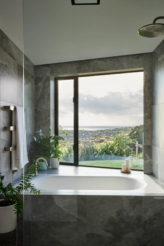 <img alt="Interior window detail at Haumoko House — slim frame with panoramic Christchurch and estuary views, Site Architecture." src="/images/2/5/1/0/2/251029lmhl016-a1451c28.webp?description" width="1536" height="2048" />