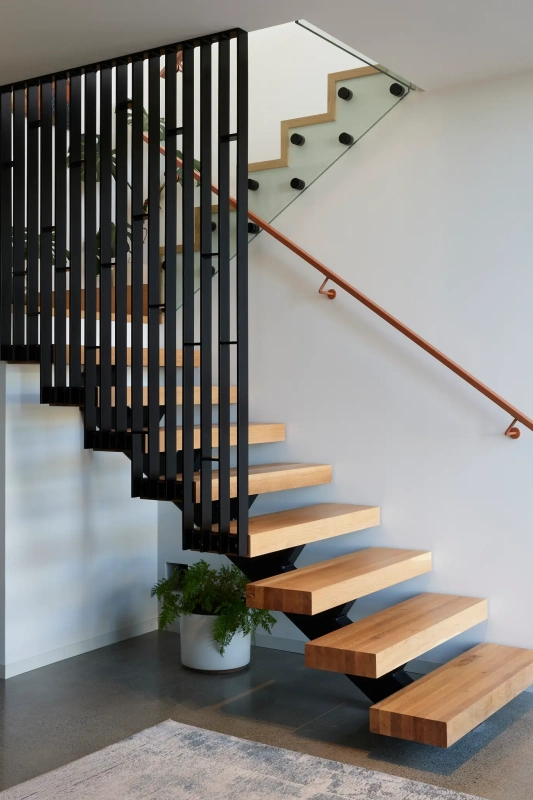 <img alt="Interior staircase at Haumoko House — dark steel balustrade with warm timber treads, Site Architecture Christchurch" src="/images/2/5/1/0/2/251029lmhl025-e4c13104.webp?description" width="1536" height="2048" />