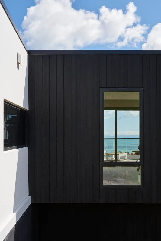 <img alt="Exterior window detail at Haumoko House — single opening in dark cladding with coastal views, Site Architecture Christchurch" src="/images/2/5/1/0/2/251029lmhl045-0bc5970a.webp?description" width="1536" height="2048" />