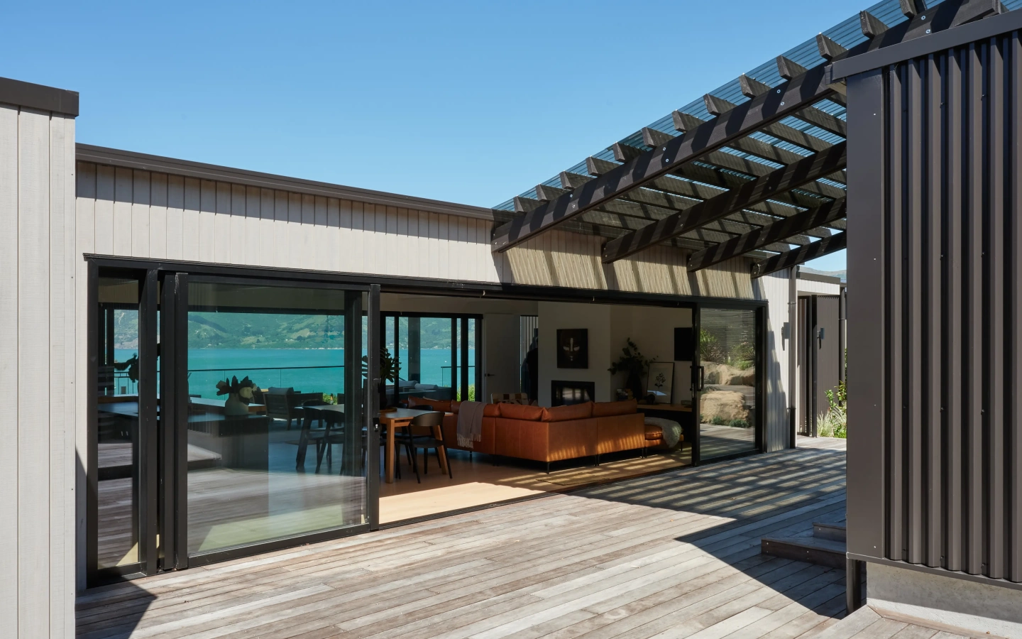<img alt="Akaroa Pentref by Site Architecture, covered outdoor pavilion with pergola looking out over Akaroa Harbour, Christchurch residential architecture." src="/images/a/k/a/r/o/akaroa-pentref-akaroa-beyond-sarah-rowlands10-8ea4f743.webp?description" width="4000" height="3000" /> fetchpriority=