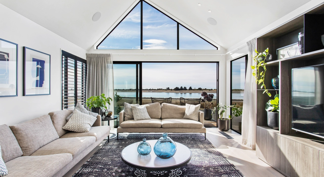 <img alt="Light filled living room with high gabled ceiling, large glazing framing sea and estuary views, Redcliffs Christchurch." src="/images/d/o/n/-/r/don-roy-site-architecture-moncks-lounge-area-6d0c6cdf.webp?description" width="2560" height="1706" />