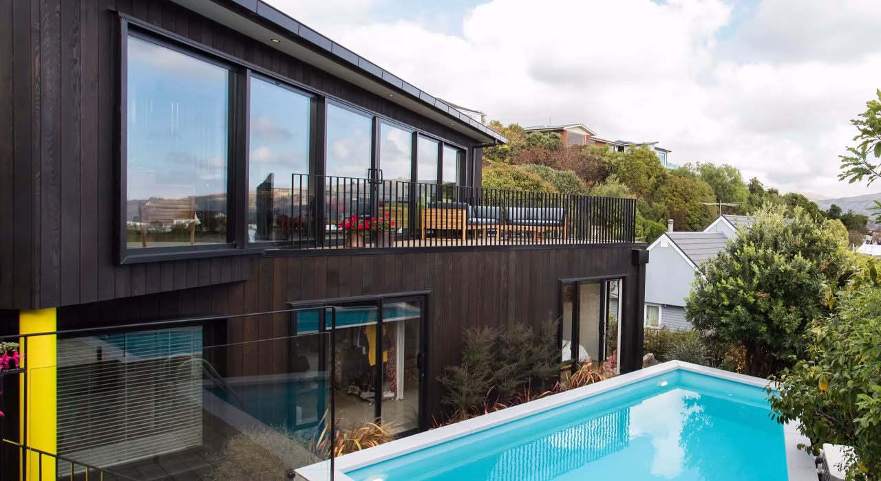 <img alt="Clementine house from below, cedar-clad volumes and expansive glazing set above a pool tucked into the St Andrews Hill site." src="/images/s/i/t/e/-/site-arch-clementine-st-andrews-hill10-1ac8dbdb.webp" width="2560" height="2388" />