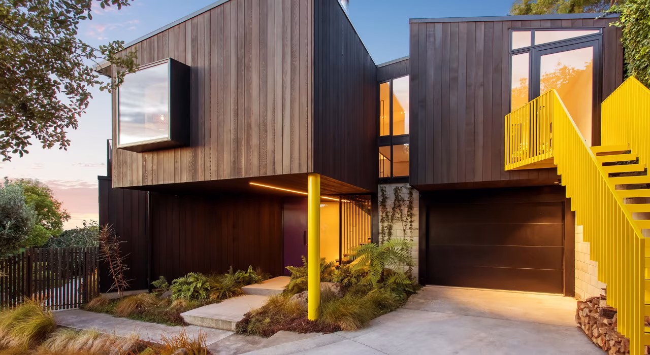 Dark cedar clad volumes with a bold yellow staircase, Clementine house, Site Architecture, St Andrews Hill, Christchurch