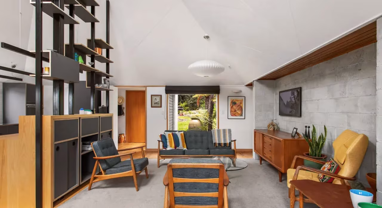 <img alt="Open living space with floor-to-ceiling display shelving, warm timber and powder-coated steel, mid-century art and objects on show." src="/images/s/i/t/e/-/site-arch-paulus-tce-8-d9e3f666.webp" width="1024" height="683" />