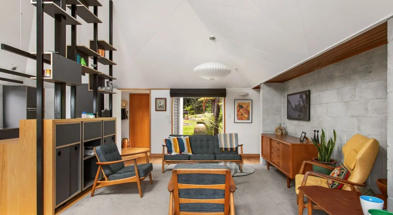 <img alt="Open living space with floor-to-ceiling display shelving, warm timber and powder-coated steel, mid-century art and objects on show." src="/images/s/i/t/e/-/site-arch-paulus-tce-8-a0edc1d9.webp?description" width="1024" height="683" />