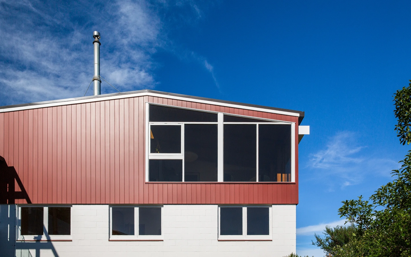 <img alt="Exterior of Hillside Modern renovation, red coloursteel cladding and mid-century roofline under a wide blue sky, Christchurch." src="/images/s/i/t/e/-/site-architects-interior-architecture-modernist12-711057d4.webp?description" width="2560" height="1707" /> fetchpriority=