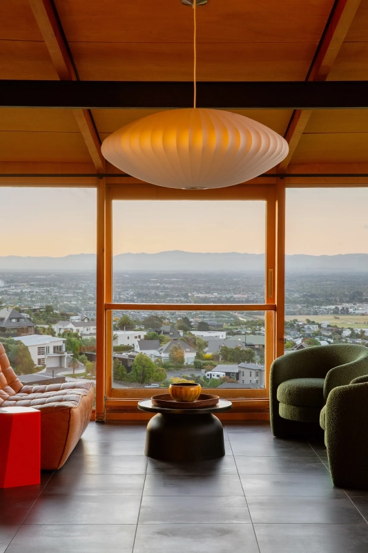 <img alt="Timber-framed windows framing a panoramic view over Christchurch and the distant hills at dusk." src="/images/s/i/t/e/-/site-architects-interior-architecture-modernist14-2a20e9f6.webp?description" width="1706" height="2560" />