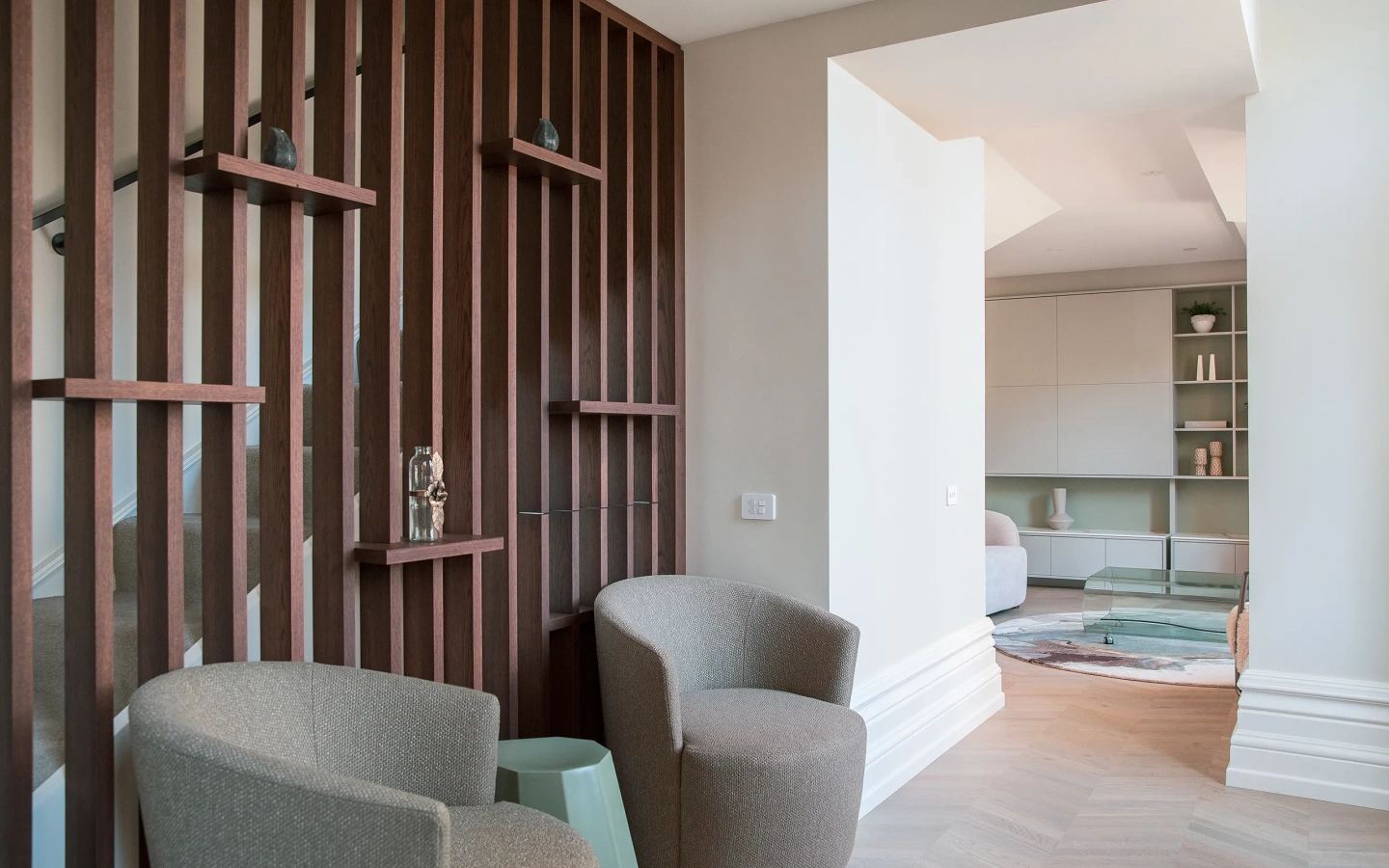 <img alt="Living area of Suite 17 with timber slat wall detail, built-in shelving and soft natural light, Old Government Building Christchurch." src="/images/s/i/t/e/-/site-architecture-suite-17-ogb-interior-architecture1-bf74e09f.webp?description" width="2560" height="1707" /> fetchpriority=