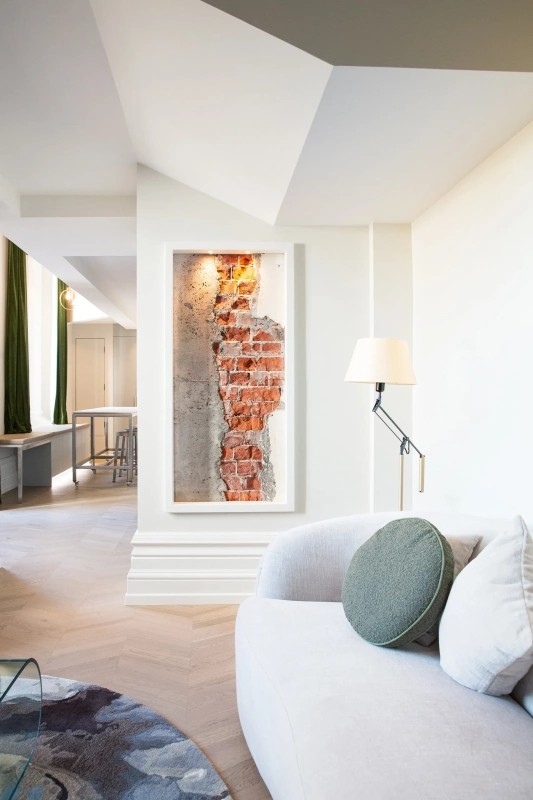 <img alt="Heritage brick wall detail alongside a contemporary bedroom, original character meeting refined modern finishes." src="/images/s/i/t/e/-/site-architecture-suite-17-ogb-interior-architecture4-1235270d.webp?description" width="1706" height="2560" />