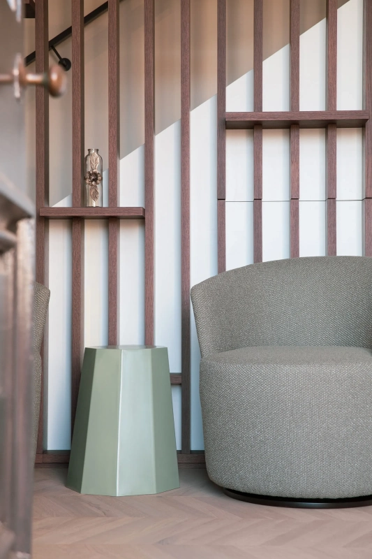 <img alt="Quiet reading nook with upholstered chairs and timber slat screen, soft light filtering through." src="/images/s/i/t/e/-/site-architecture-suite-17-ogb-interior-architecture5-837aff6b.webp?description" width="1706" height="2560" />