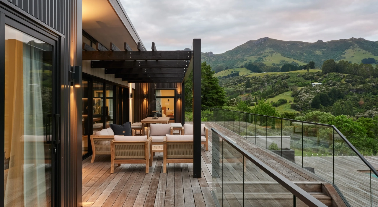 <img alt="South-western deck at Akaroa Pentref. Outdoor living with harbour and hillviews at dusk, Site Architecture residential design." src="/images/s/o/u/t/h/south-western-deck-akaroa-pentref-site-architecture-srp-83e99a2e.webp?description" width="4000" height="3000" />