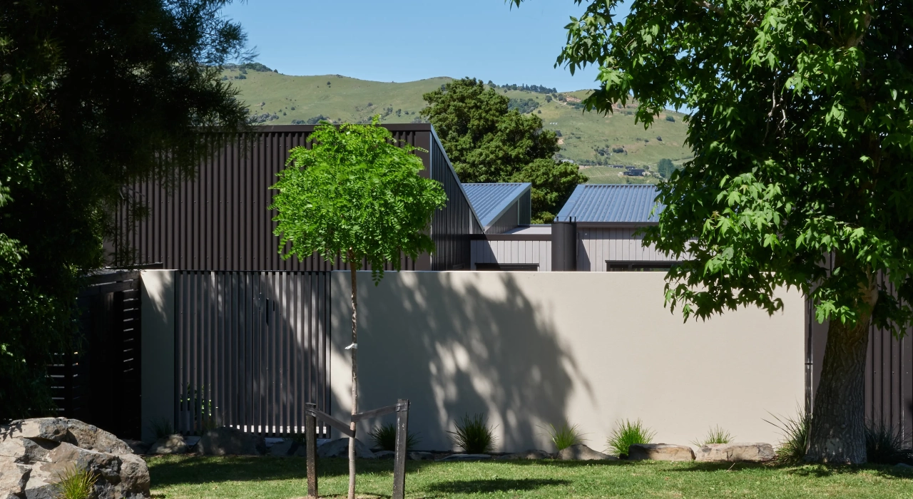 <img alt="Street view of Akaroa Pentref. Dark clad buildings nestled into Banks Peninsula hillside, Site Architecture Christchurch." src="/images/s/t/r/e/e/street-view-akaroa-pentref-site-architecture-srp-243b7984.webp?description" width="4000" height="2999" />